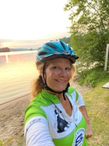 Female veterinarian in a cycling fundraiser.